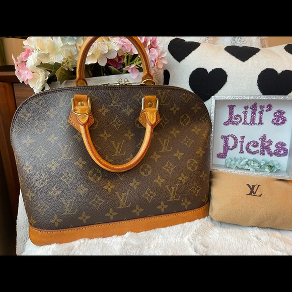 Pre love Alma LV, a sign of watermark, and burn. - Picture 3 of 16